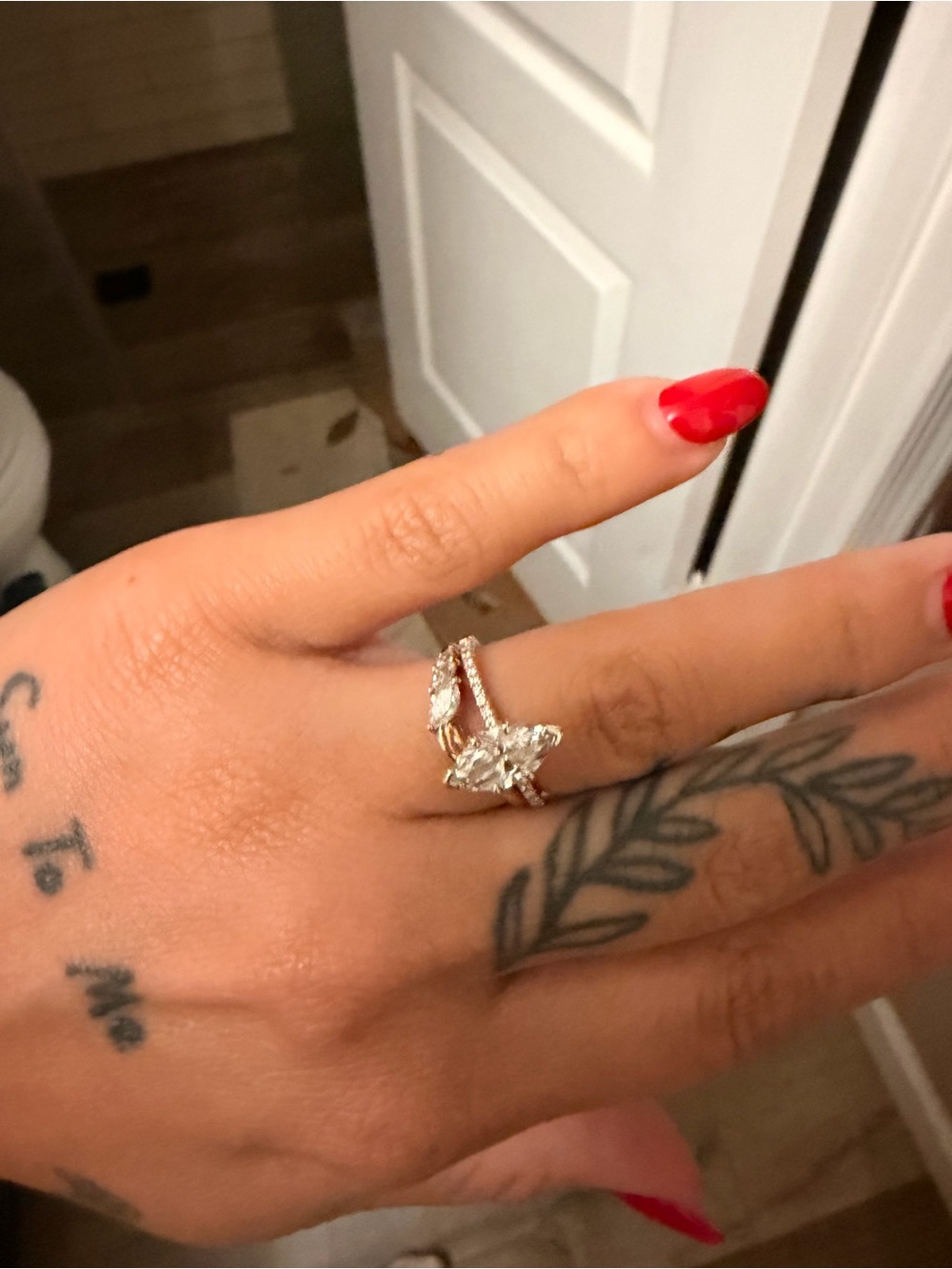 Moissanite curved marquise ring